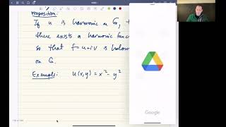 Harmonic functions and holomorphicity