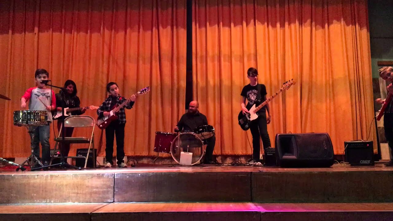 Liam Brigden in Music House Show playing Bass Guitar "Back in Black