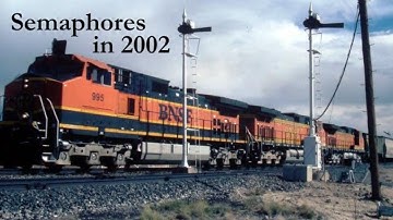 BNSF C44-9W 995 passes Semaphore Signals in Levy, NM, Sept. 2002