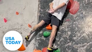 Celebrity Rock climber impressively scales wall with hands behind his back | USA TODAY Wealth