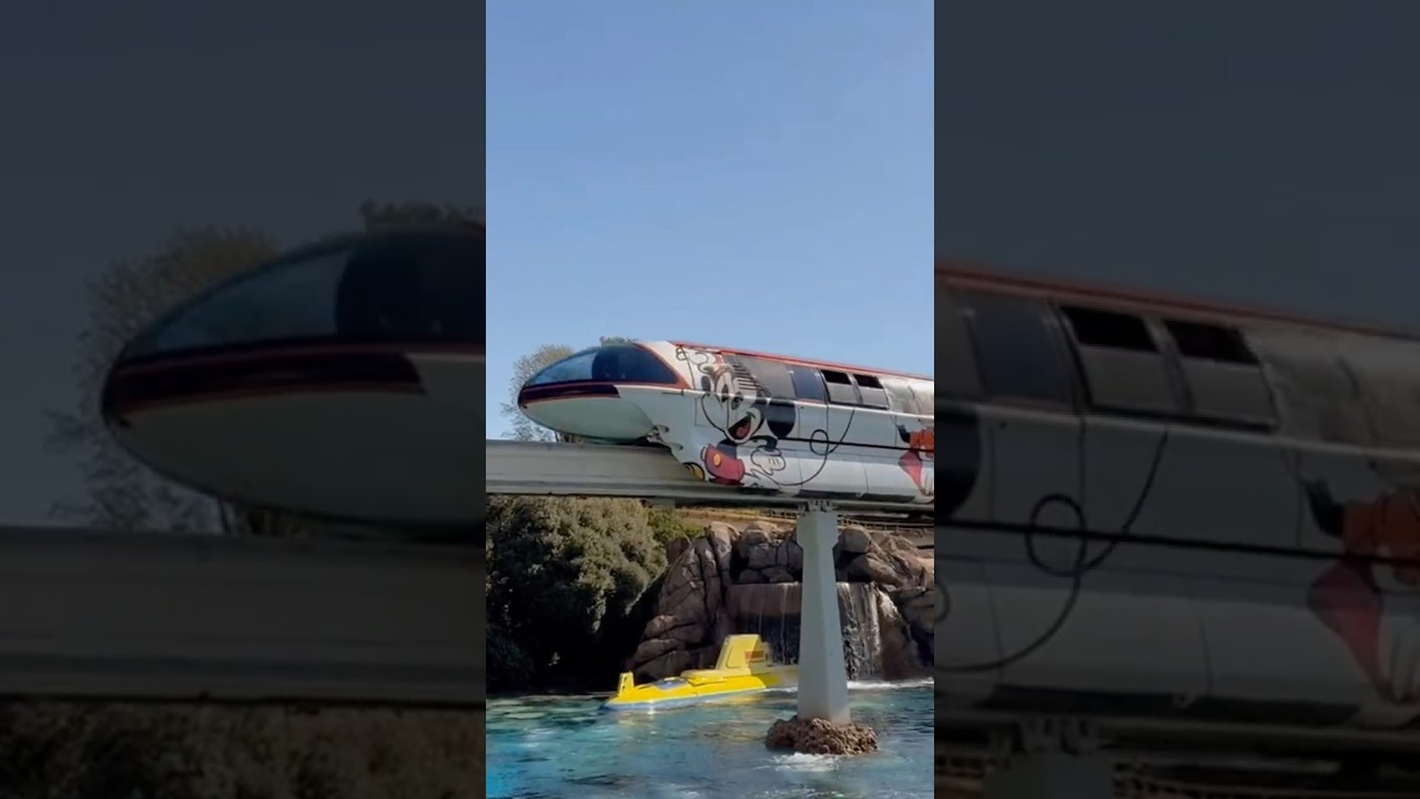The Monorail passes over a Submarine at Disneyland!
