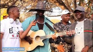 Gifting Ndolo Syano guitar and speaker at Maiuni Village Matuu