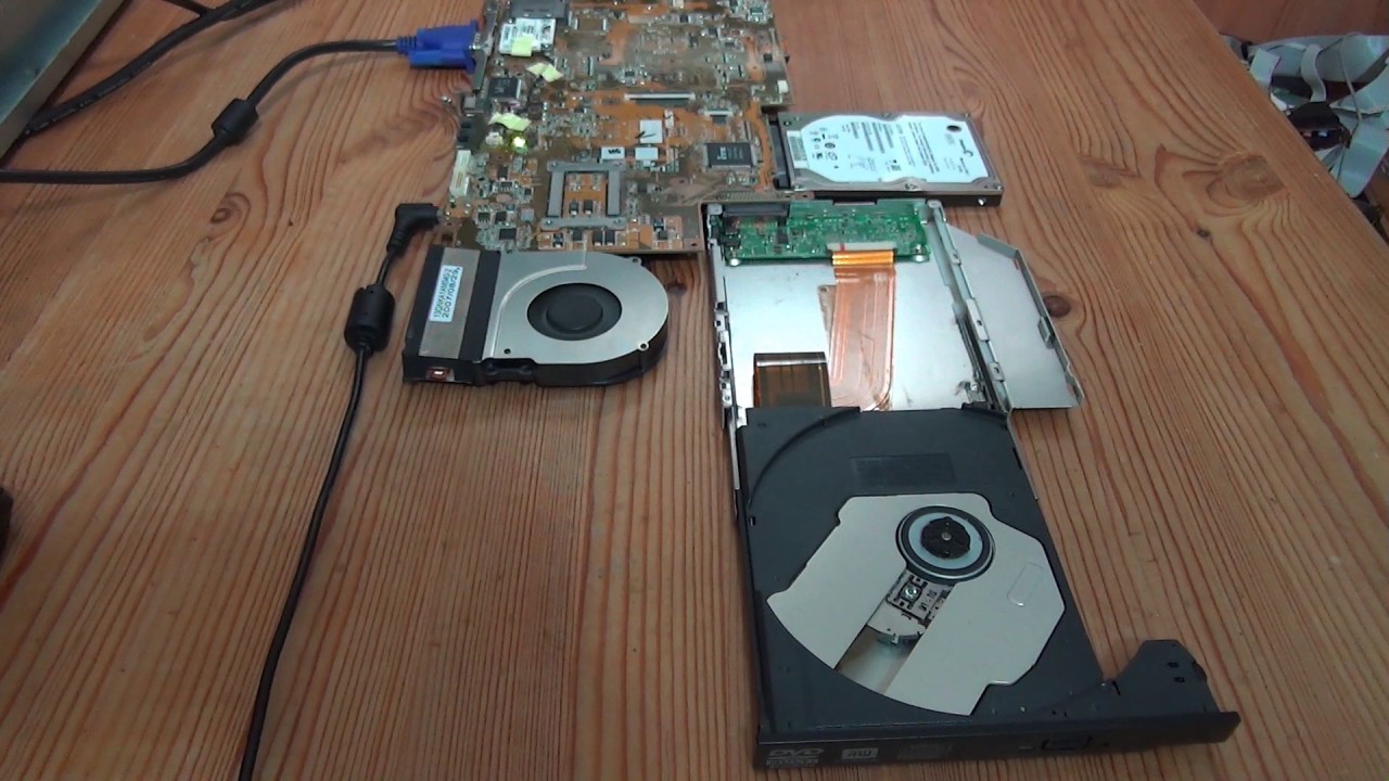 Opening DVD drive while running - YouTube