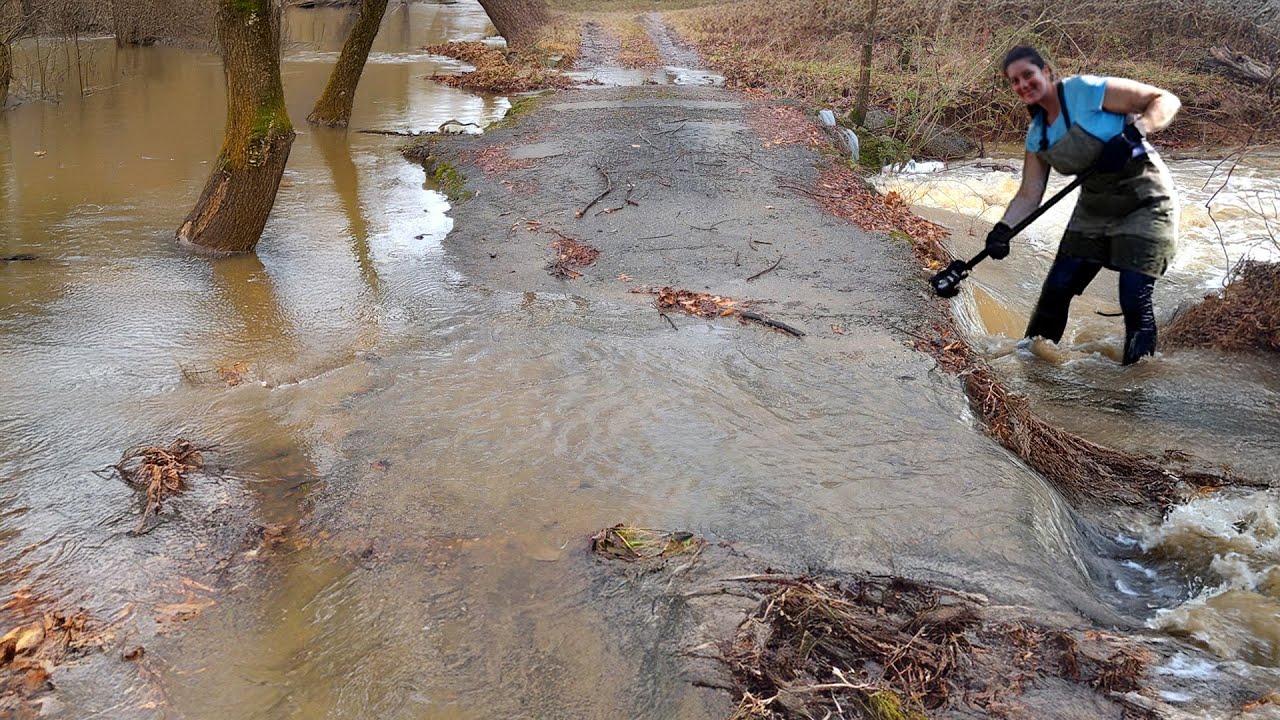 Unclogging a Culvert Restoring the Flow After a Massive Blockage - YouTube