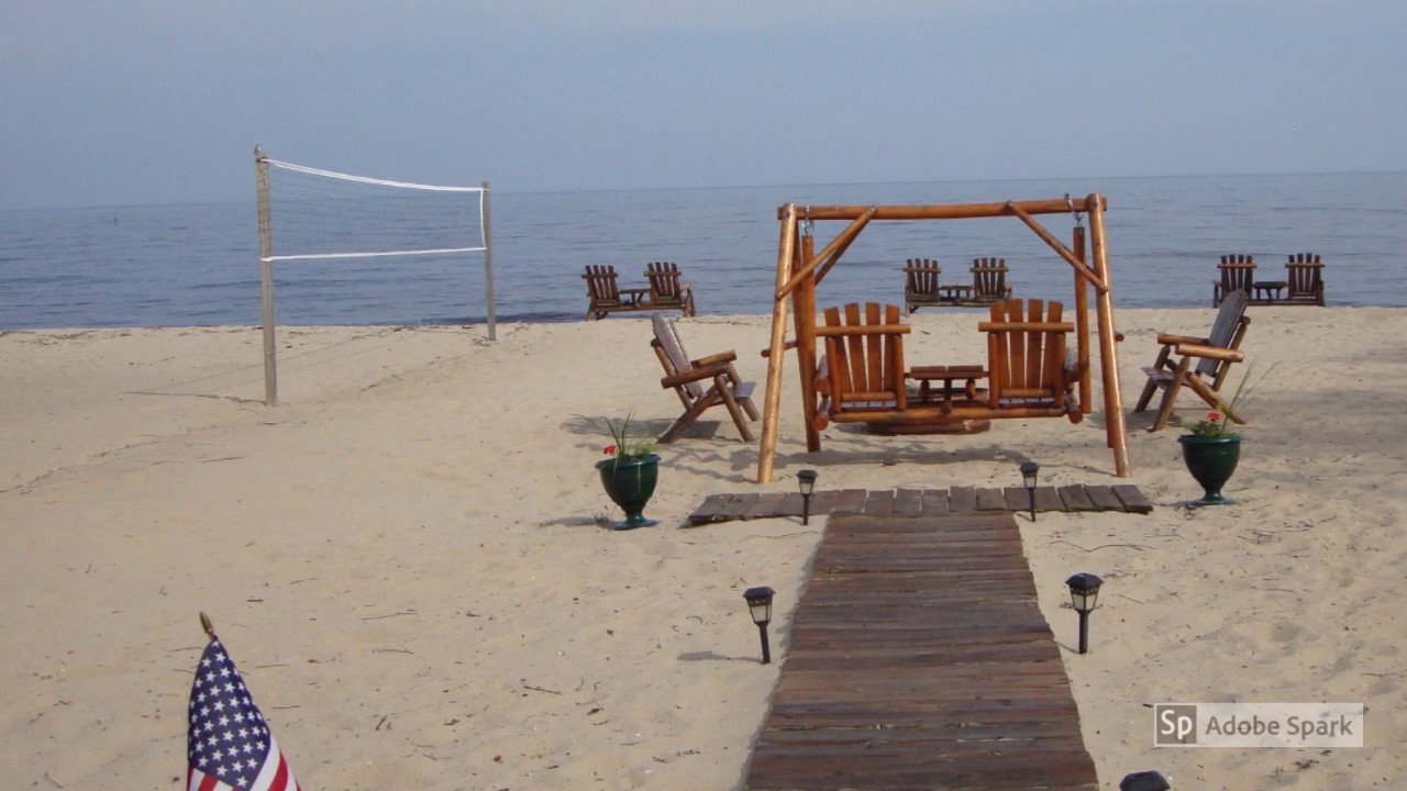 Tawas Resorts, Cabins & Hotels:  Young's Getaway Beachfront Resort. Tawas Sandy Beach Destination !