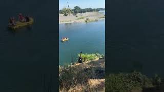 Woman goes on rope swing but lets go too early and falls on sand