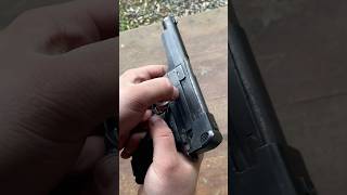 Sear Firing a Japanese Type 94 Nambu Pistol