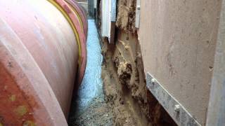 Native Soil CLSM - Flow into the 36 inch pipe haunch