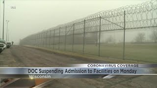 Virus leads Wisconsin state prisons to suspend admissions