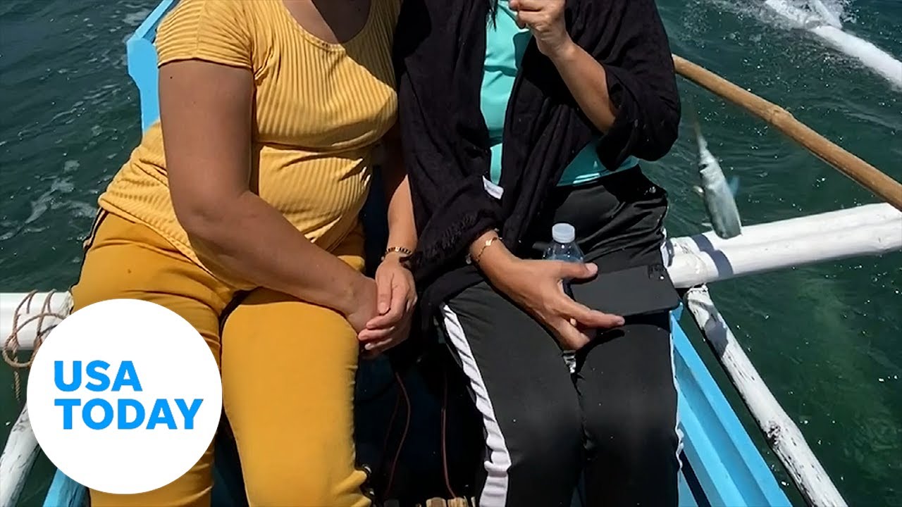 Woman’s phone falls overboard thanks to a flying fish | USA TODAY