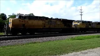 UP 5494 a C45ACCTE leads a Z train with UP 5511 as a mid DPU west in Dixon IL