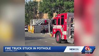 New Orleans Fire truck stuck in sinkhole in Central City