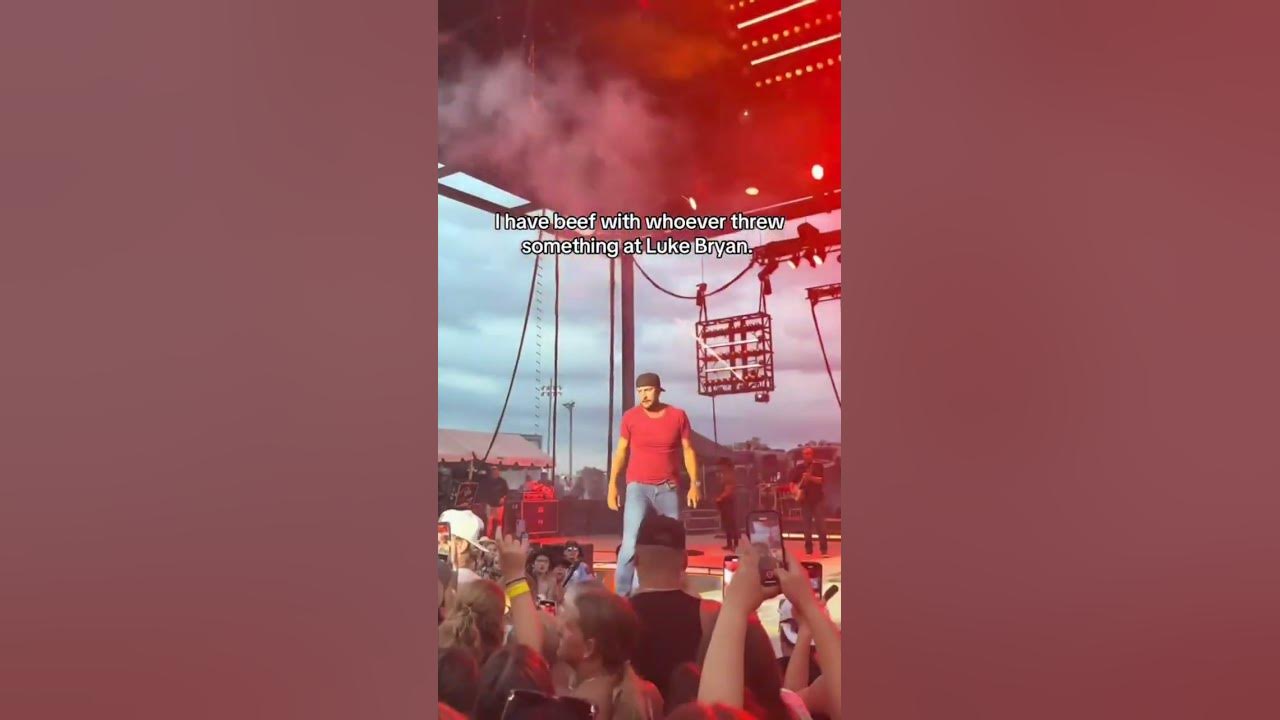 Luke Bryan gets hit in the face during concert