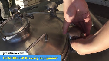 How to open a top manhole on  a beer fermenter