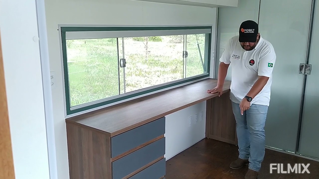 Cozinha e Suíte container com valor no vídeo.