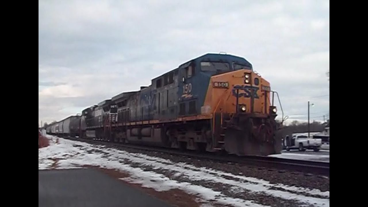 CSX #150 NORFOLK SOUTHERN #9672 TAILINING IN MARSHVILLE N.C. ON 2/15/14 ...