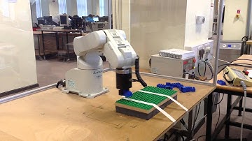 Mitsubishi RV-2AJ playing with duplo