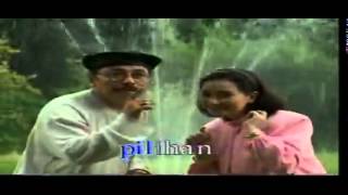 Video voorbeeld van "DUNIA BELUM KIAMAT   TITIEK SANDHORA & MUCHSIN (Bunga Keabadian)"