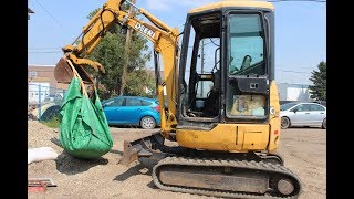 Startup and walk around of John Deere 27C ZTS excavator
