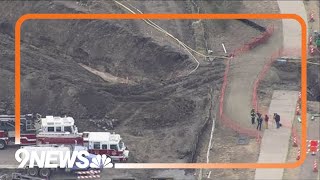 Crews rescue 2 people from trench at construction site