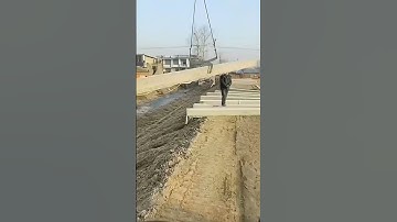 Using excavator unloading precast concrete slabs