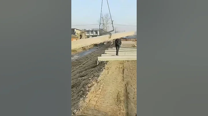 Using excavator unloading precast concrete slabs