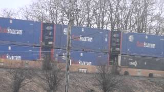 CSX Intermodal Train Roars by on Raised Tracks