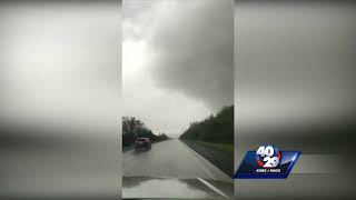 Local couple survives driving through tornado Wealth