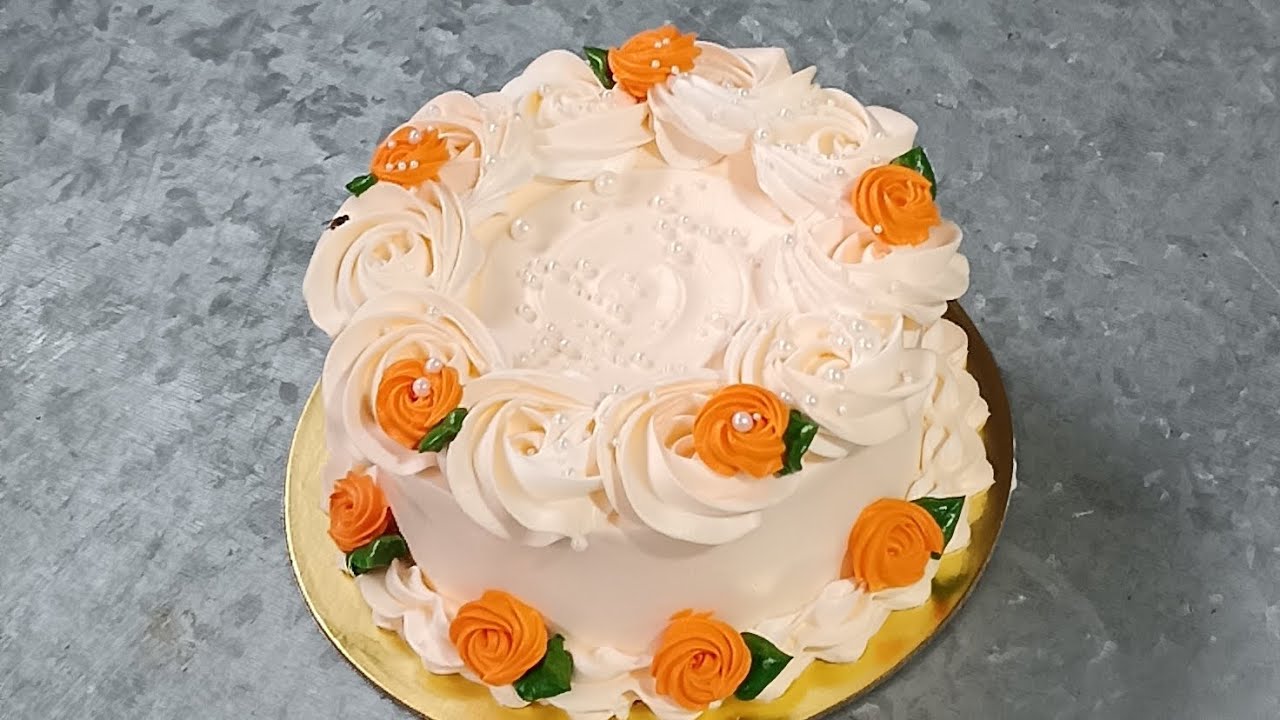 new design cake 500 gram orange colour design