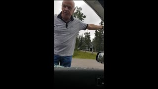 Psychopathic old man smash's 2 windows out of guys car