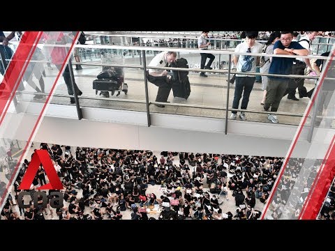 Protest at Hong Kong airport still underway as midnight deadline approaches