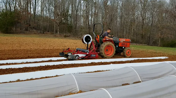 Laying a 100' Foot Row of Plastic Mulch