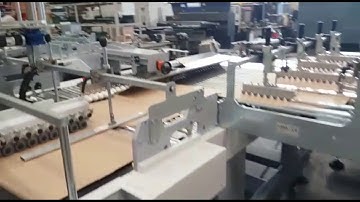 Application of tear tape and double sided tape on corrugated board | Ortigia Machine A/17