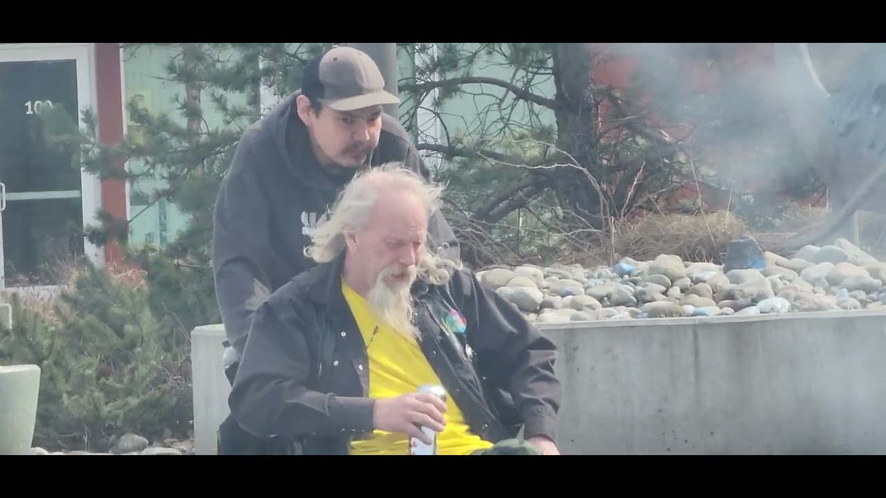 Nice Man Helping Another Guy In A Wheelchair Mountain View Anchorage nice-man-helping-another-guy-in-a-wheelchair-mountain-view-anchorage