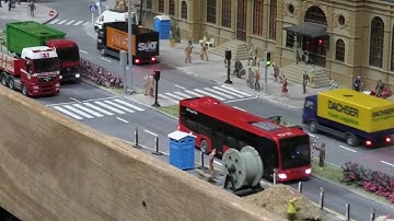 Faller Car System Digital     Vehicles stop for pedestrian crossing with traffic-lights.