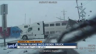 Train slams into Fedex Truck