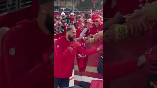 Mike Evans signs for fans before