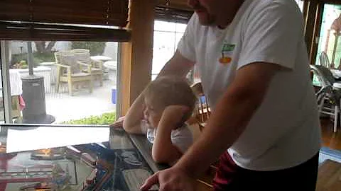 Ayden and Daddy playing Evel Knievel pinball