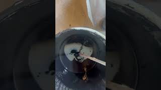 Mixing paint with impact driver.