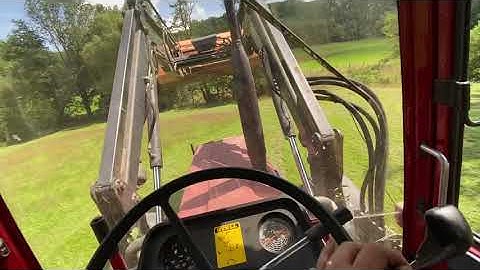 Steep hill mowing International 845 xl