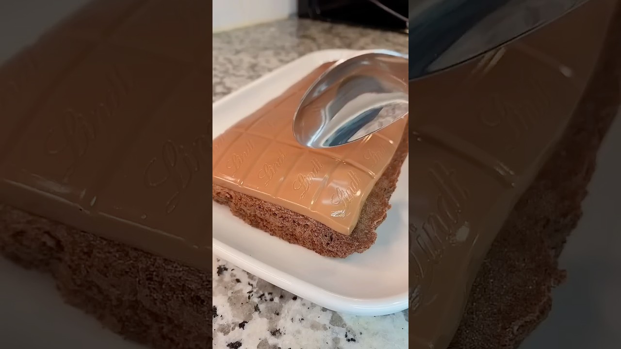 Chocolate cake with a whole block of chocolate on top 🔝