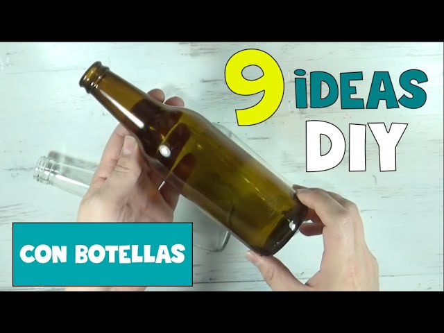 Botella decorada con piedras o gemas de cristal, algunas con fondo pintado  y decorado con brillan…