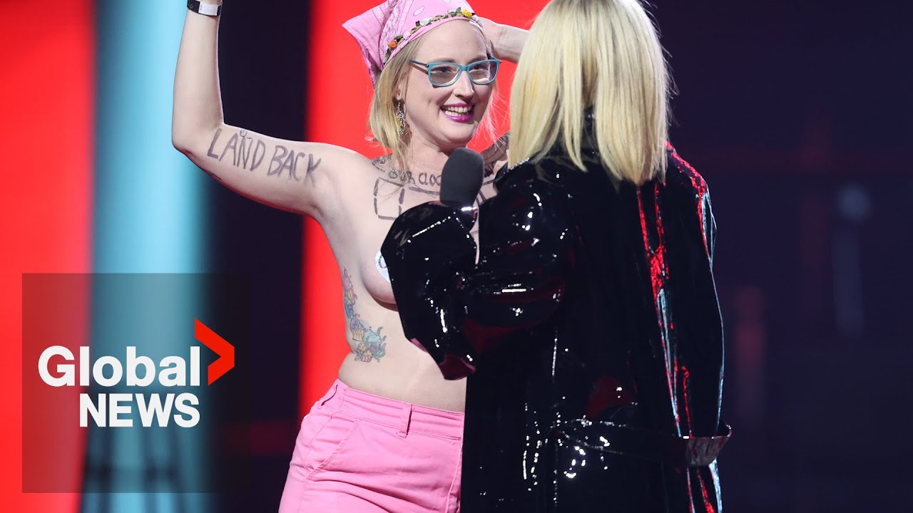 Topless Juno Awards protester calls for drastic moves on climate change