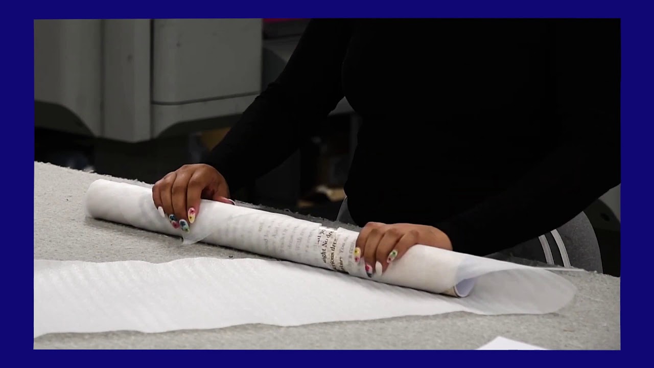 Poster Rolling & Packaging