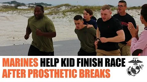 Marines Help Kid Finish Race After Prosthetic Leg Breaks