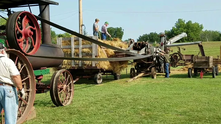 1913 Aultman Taylor steam tractor running a thresh...