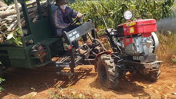 xe công nông 1 câu chở cây lên dốc