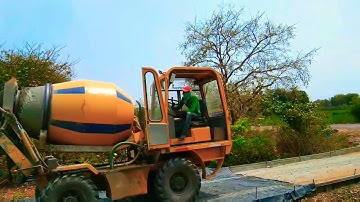 ##Karimnagar local  #ajax flori self loading mixer CC road unload footage 2020