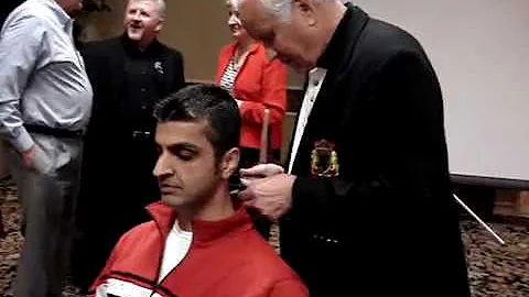 Dr. Rahim getting adjusted by the Chiropractic Wiz...