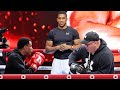 Anthony Joshua NOT INTERESTED in workout; Watches kids hit mitts instead!